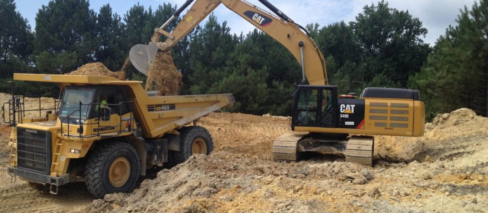 Cat349e Loading Dirt Onto Komatsu Dump Truck At Lexington Maintenenace Site Prep Heavy Civil Project