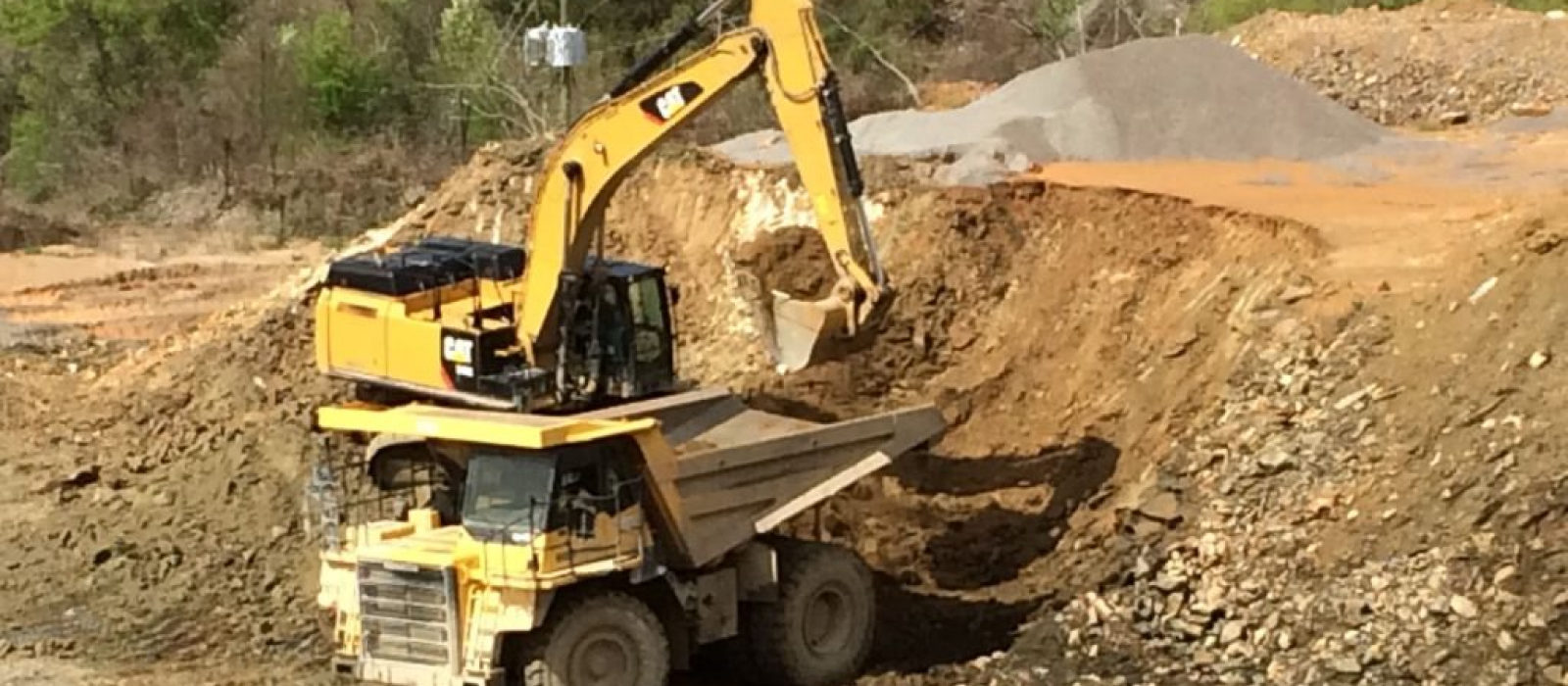 Heavy Equipment Moving Dirt For Site Prep At The Martin Marietta Augusta Quarry