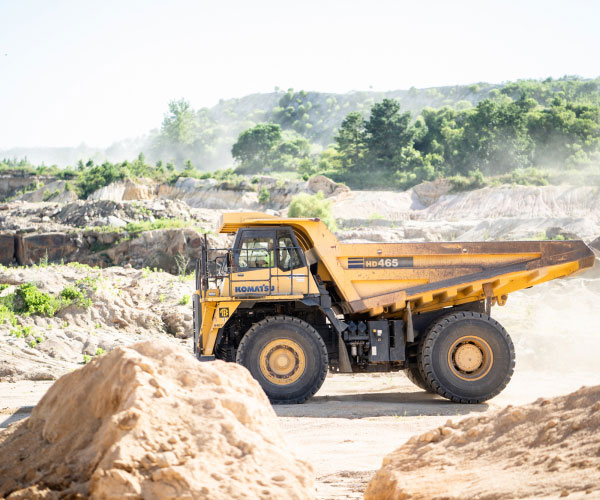 Komatsu Hd465 Truck At Mining Job Site