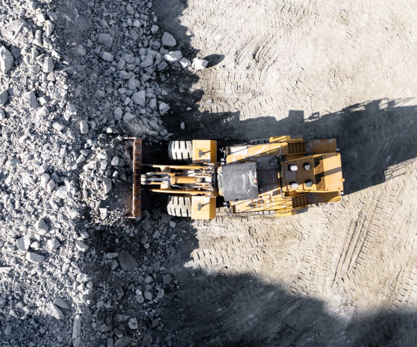Aerial View Of Heavy Equipment At Mining Job Site