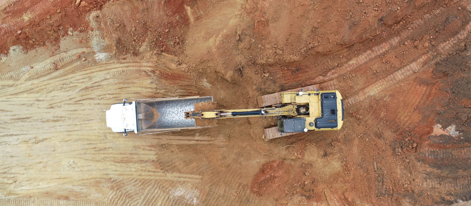 Red Deere-Blue Cell aerial photo of dump truck and scoop