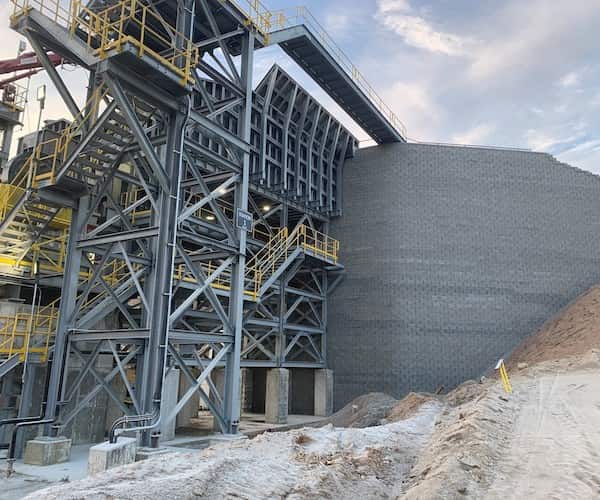 scaffolding and a large retaining wall